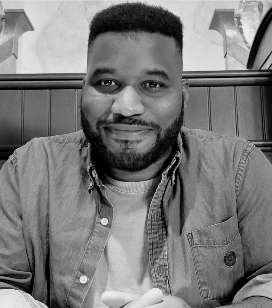Left: Mckendy Fils-Aimé, a Haitian-American poet, looks at the camera with a closed-mouth smile. He wears a button-down shirt and a white tshirt. 